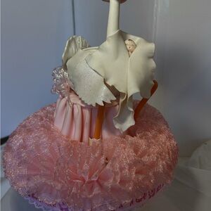 Pink swan baby shower table decoration